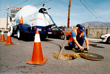 Public Works Employee Working on a Sewer